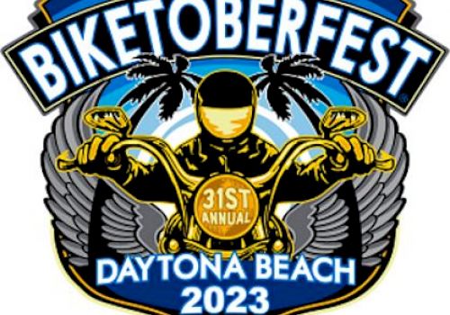 The image is a logo for Biketoberfest in Daytona Beach, 2023, featuring a biker with palm trees, wings, and text indicating the 31st annual event.