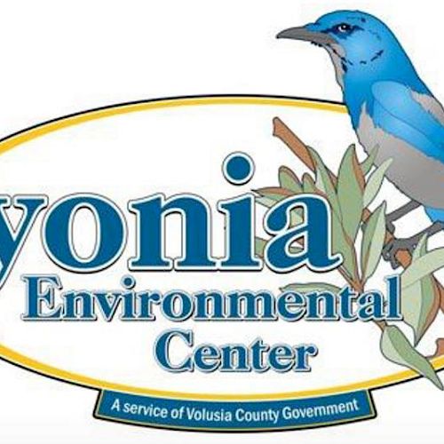 Logo for Lyonia Environmental Center featuring a blue bird perched on branches with text "A service of Volusia County Government."