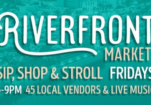 Riverfront Market sign: &ldquo;Sip, Shop & Stroll Fridays, 5-9PM, 45 local vendors & live music.&rdquo;