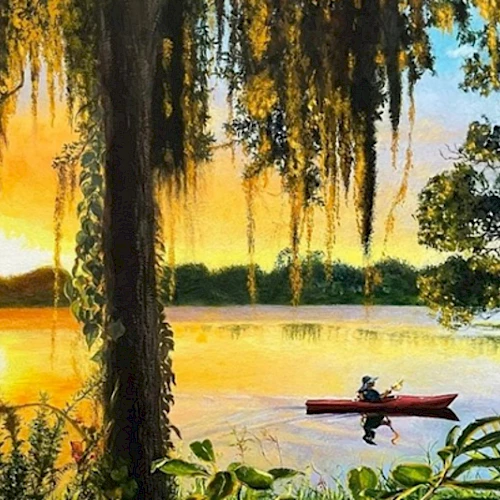 A tranquil lakeside sunset with hanging Spanish moss, lush greenery, and a person paddling a red canoe across calm waters.