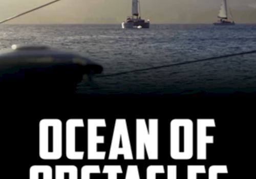 The image shows boats sailing on the ocean with the text "Ocean of Obstacles" at the bottom.