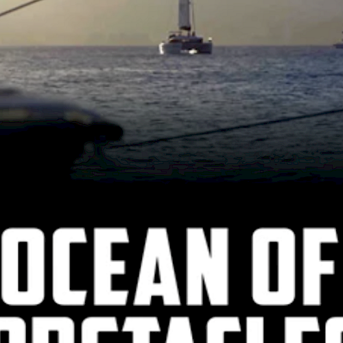 The image shows boats sailing on the ocean with the text "Ocean of Obstacles" at the bottom.