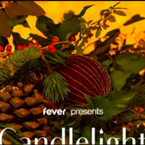 The image features holiday-themed decorations with pinecones, leaves, and berries, and text "fever presents Candlelight."