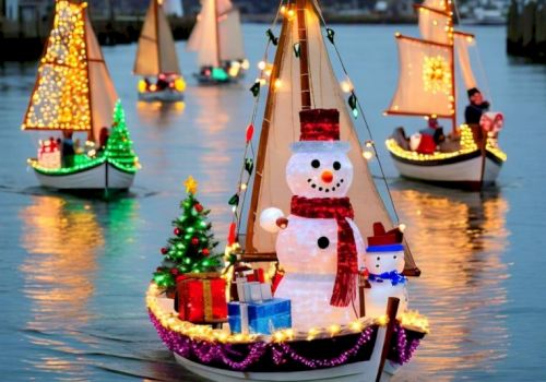 Colorful Christmas boats float on water with illuminated sails, a big snowman centerpiece, gifts, and tiny festive figures aboard.