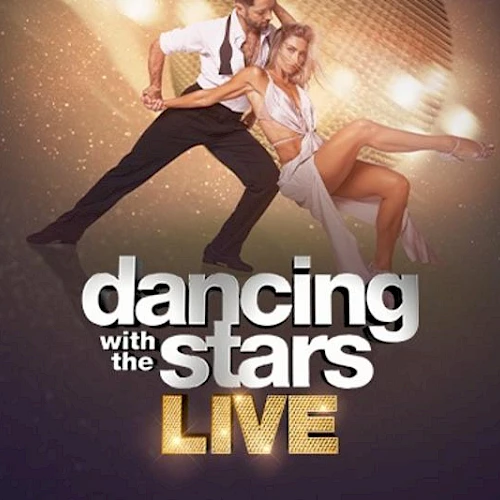 Dancers performing a dynamic split and dip mid‑dance on a glittering stage, promoting "Dancing with the Stars Live."